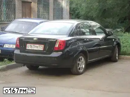 Фото автомобиля CHEVROLET LACETTI, 2007 — госномер О167РМ174. Цвет: ЧЕРНЫЙ