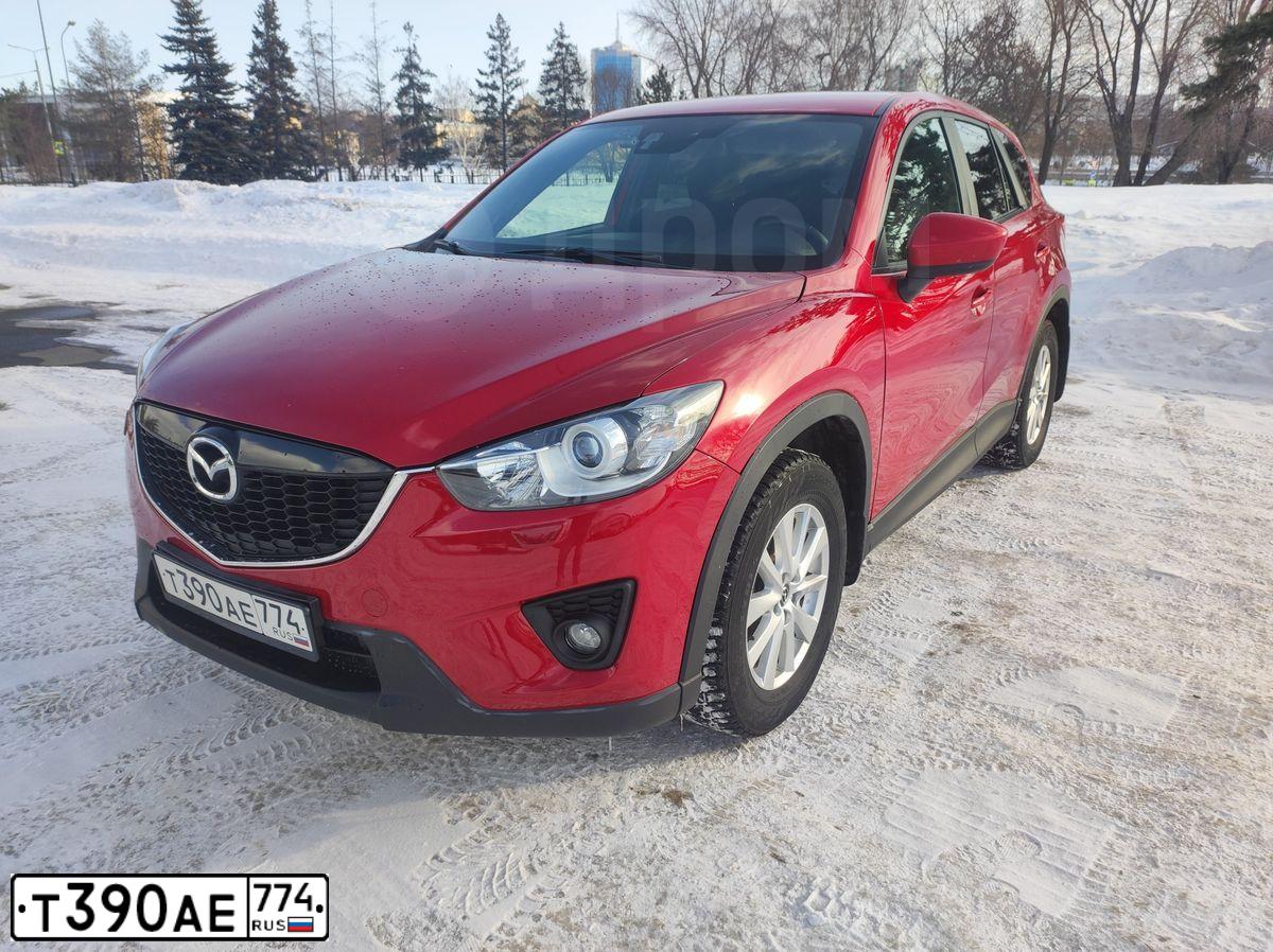 Фото автомобиля MAZDA CX-5, 2013 — госномер Т390АЕ774. Цвет: КРАСНЫЙ