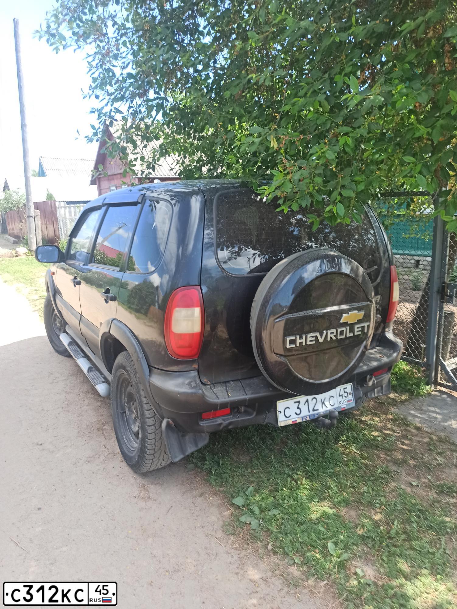 Фото автомобиля CHEVROLET NIVA, 2007 — госномер С312КС45. Цвет: ЧЕРНО-СИНИЙ МЕТАЛЛИК