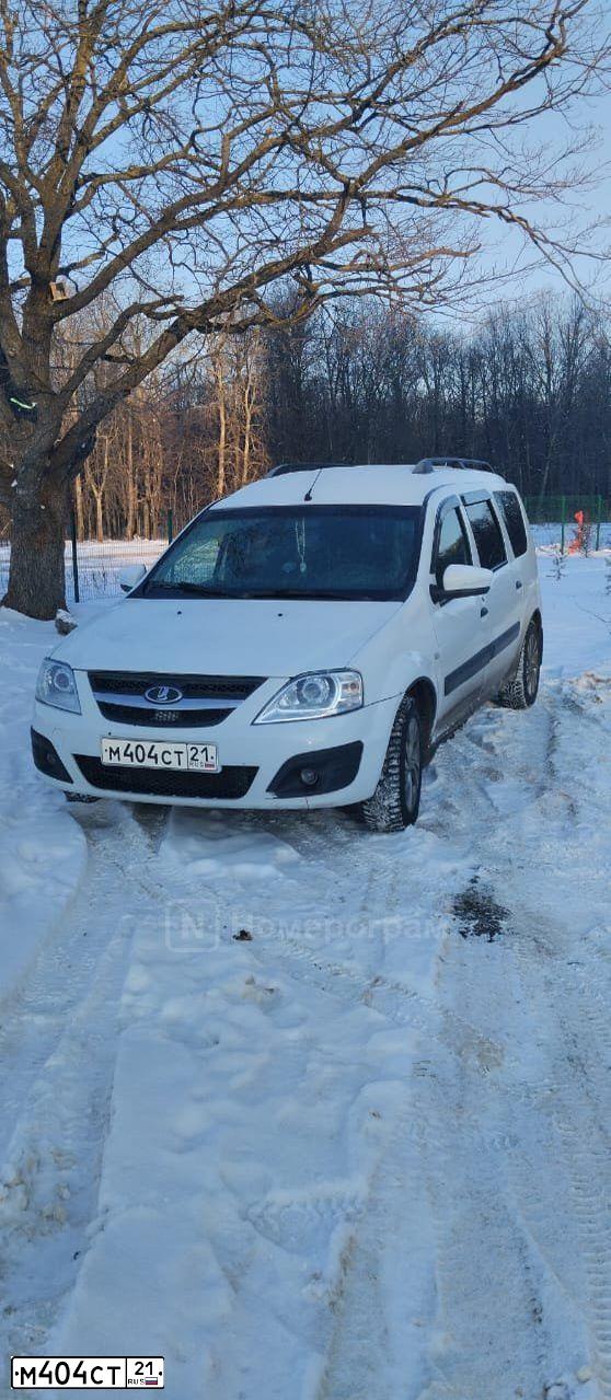 Фото автомобиля LADA LARGUS, 2020 — госномер М404СТ21. Цвет: Белый
