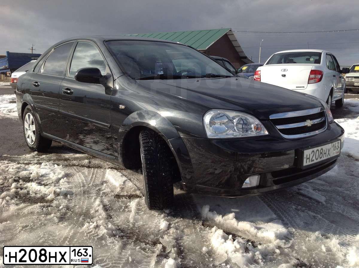 Фото автомобиля CHEVROLET LACETTI, 2007 — госномер А274РЕ164. Цвет: ЧЕРНЫЙ