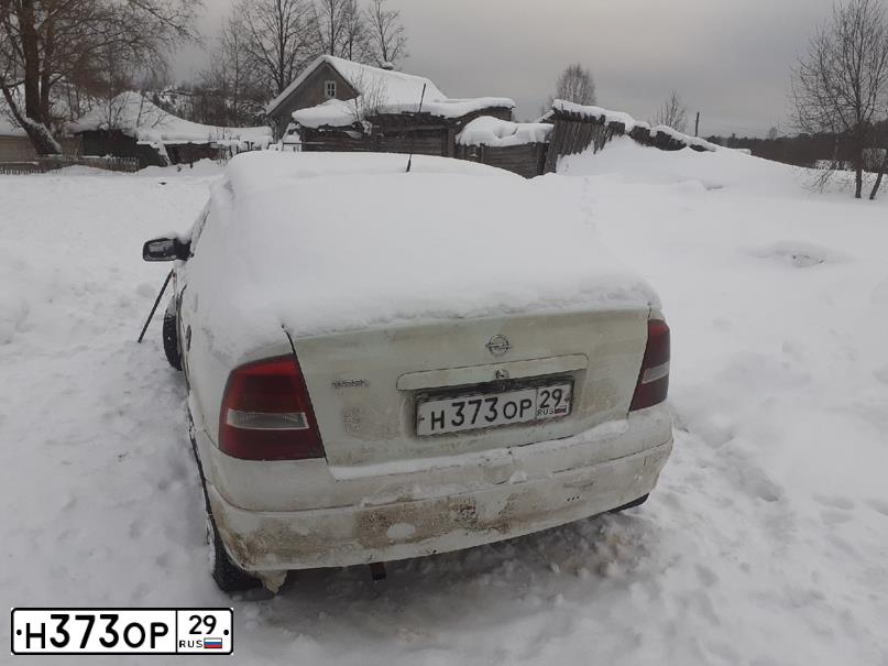 Фото автомобиля ОПЕЛЬ АСТРА, 1998 — госномер С373ОК29. Цвет: Белый