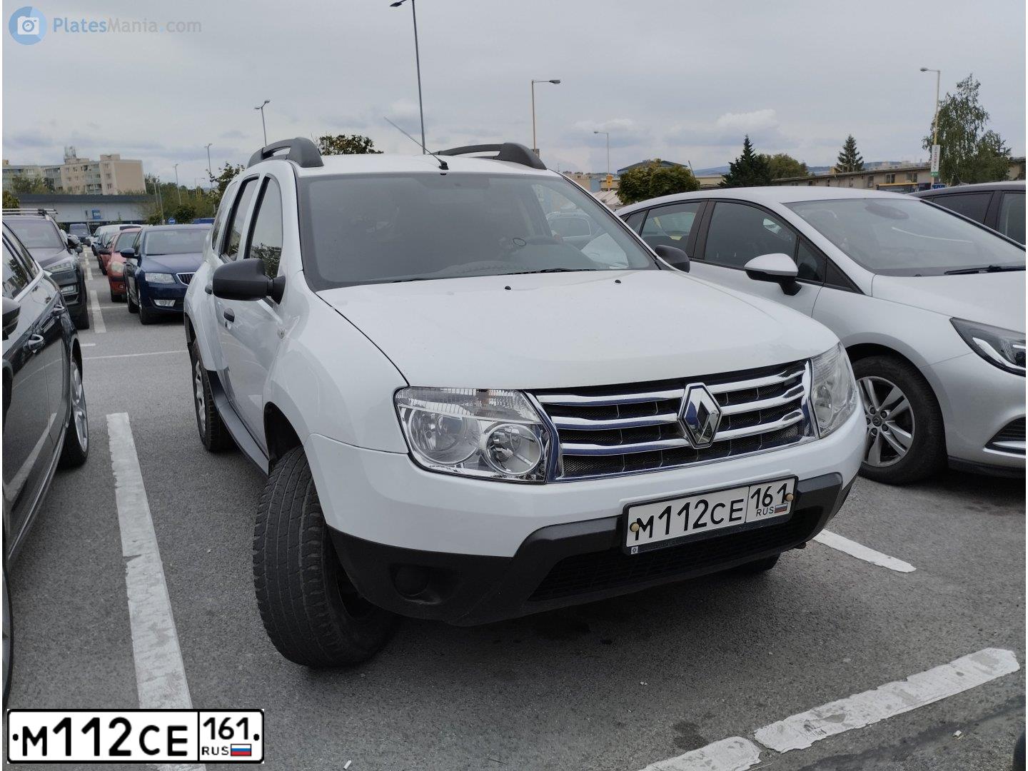 Фото автомобиля RENAULT DUSTER, 2013 — госномер М112СЕ161. Цвет: БЕЛЫЙ