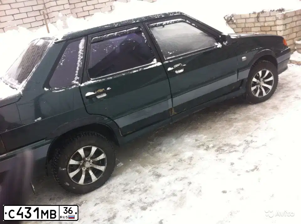 Фото автомобиля LADA 2115 SAMARA, 2001 — госномер Р909ЕВ36. Цвет: Темно-зеленый