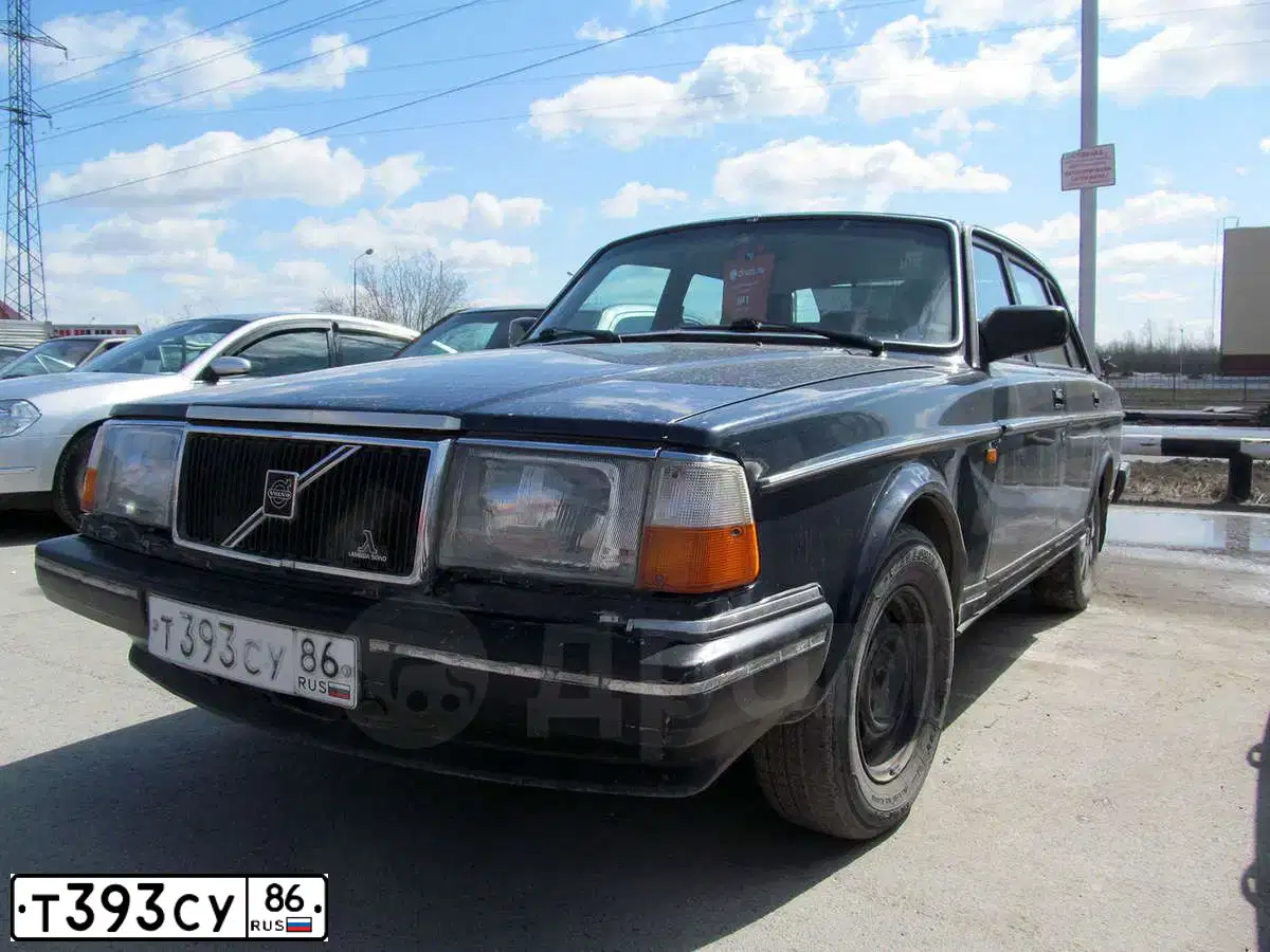 Фото автомобиля VOLVO 240-SERIE, 1990 — госномер Х479ВЕ186. Цвет: СИНИЙ