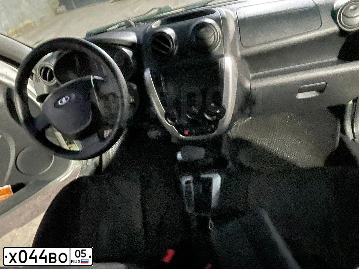 Фото автомобиля LADA 2190 GRANTA, 2013 — госномер Х044ВО05. Цвет: Белый