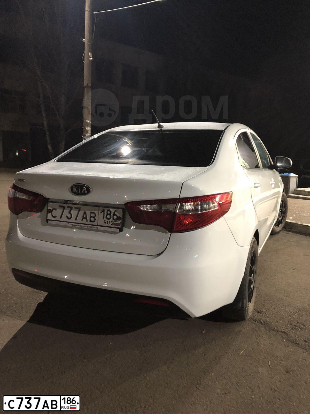 Фото автомобиля KIA RIO, 2012 — госномер У760ХА72. Цвет: Белый