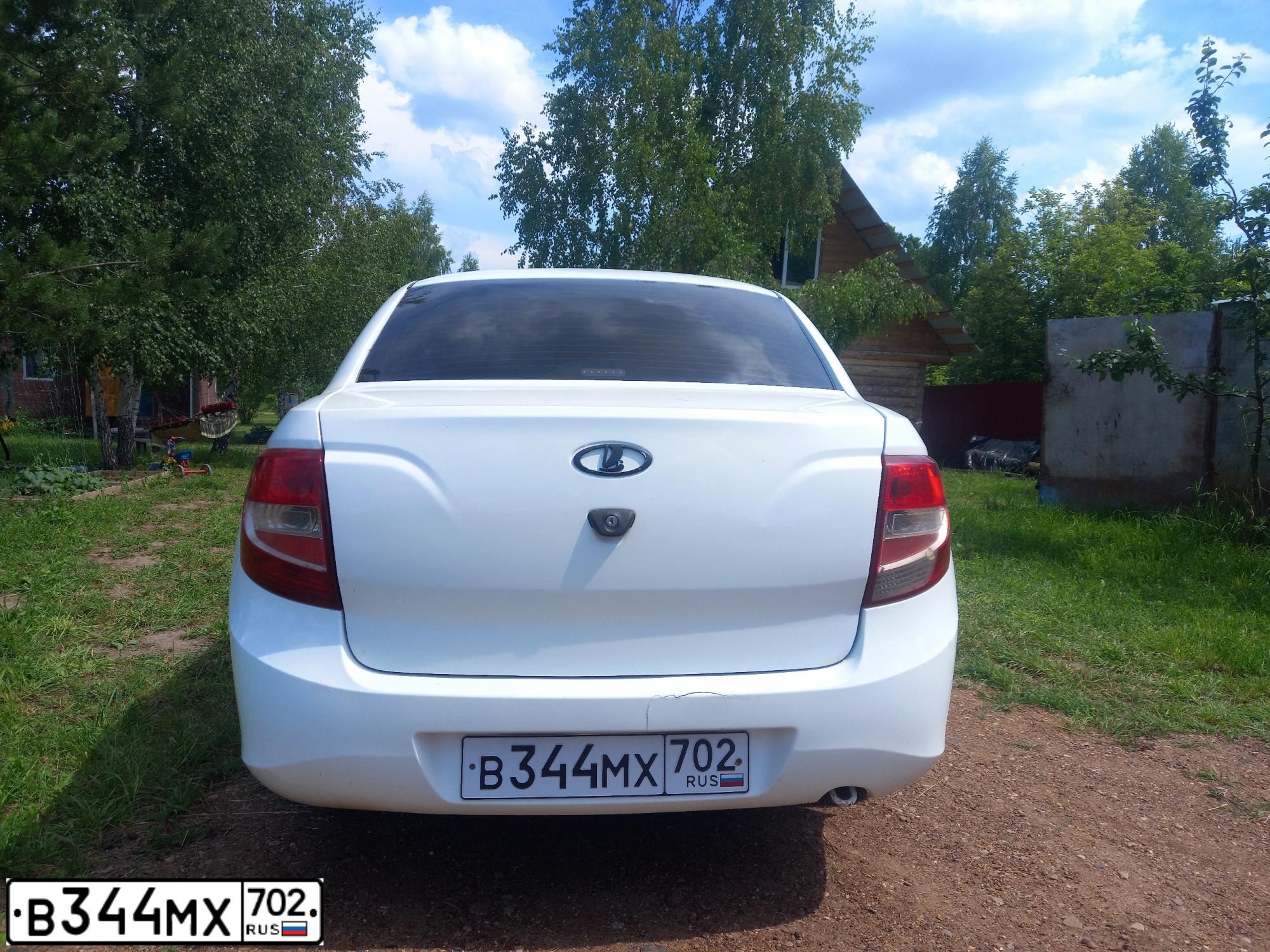 Фото автомобиля LADA 2190 GRANTA, 2013 — госномер Е799КР18. Цвет: Белый