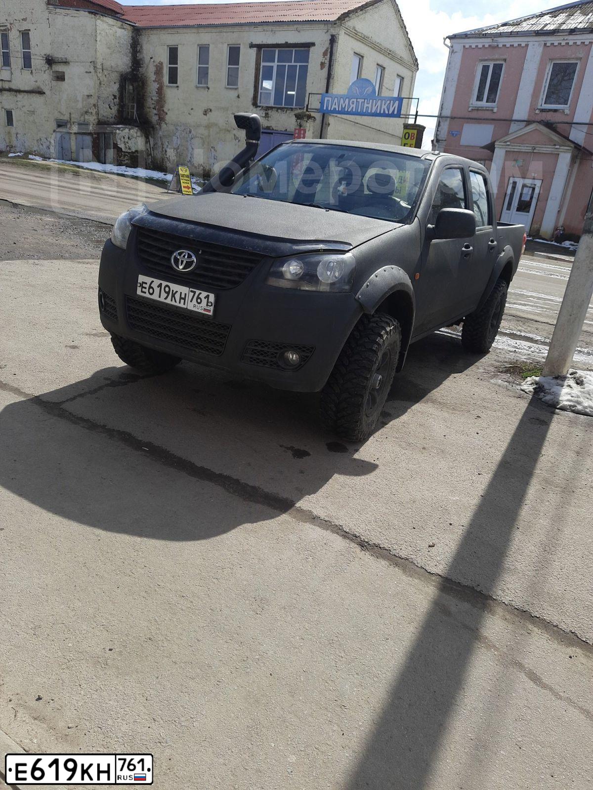 Фото автомобиля GREAT WALL WINGLE, 2012 — госномер Е619КН761. Цвет: ЧЕРНЫЙ