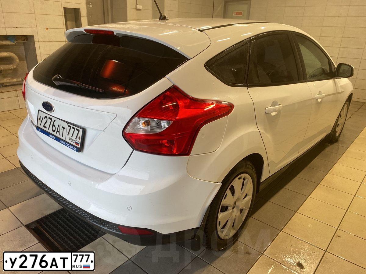 Фото автомобиля FORD FOCUS, 2013 — госномер О634МК32. Цвет: Белый