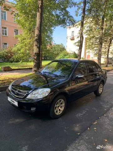 Фото автомобиля LIFAN BREEZ, 2010 — госномер О806КВ30. Цвет: ЧЕРНЫЙ