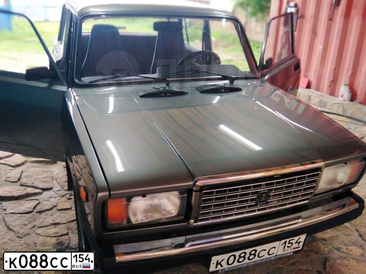 Фото автомобиля LADA 2107 LADA, 2010 — госномер К068СС154. Цвет: средний серо-зеленый металлик