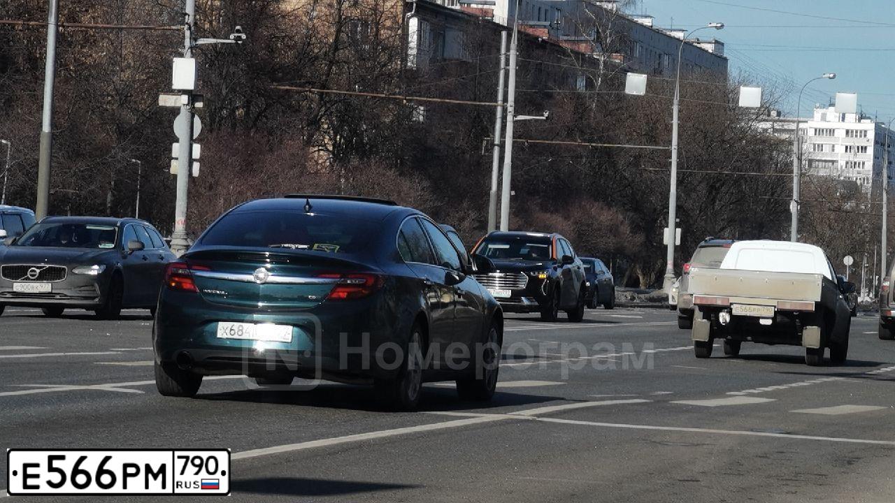 Фото автомобиля BMW SERIE 5, 2012 — госномер Е566РМ790. Цвет: ЧЕРНЫЙ