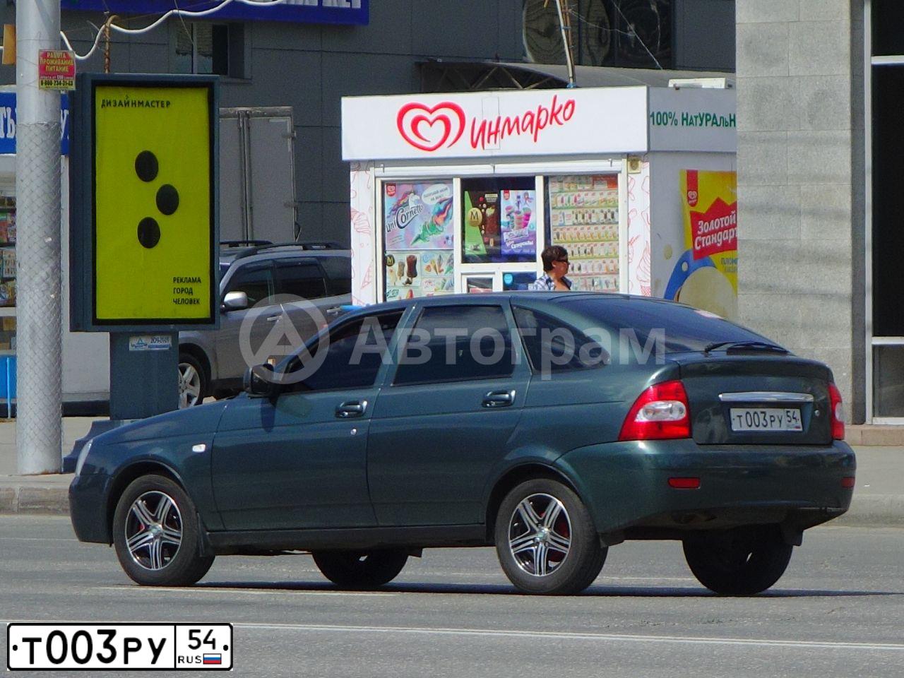 Фото автомобиля LADA 2104 LADA, 2009 — госномер Т003РУ54. Цвет: ЗОЛОТИСТО-БЕЖЕВЫЙ