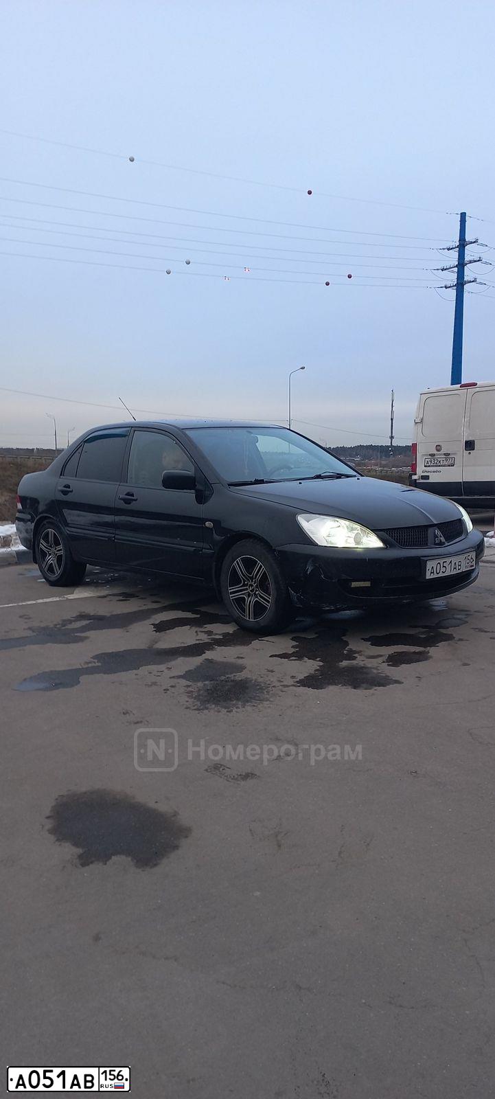 Фото автомобиля MITSUBISHI LANCER, 2006 — госномер А051АВ156. Цвет: ЧЕРНЫЙ