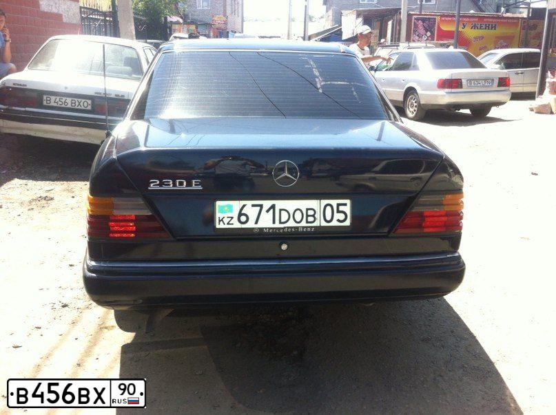 Фото автомобиля RENAULT LAGUNA, 2004 — госномер Т324ОВ67. Цвет: Белый