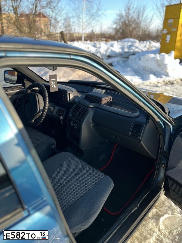 Фото автомобиля LADA 2110 LADA, 2003 — госномер Е582ТО13. Цвет: Сине-зеленый
