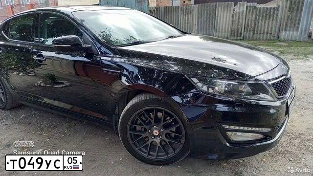 Фото автомобиля KIA MAGENTIS / OPTIMA, 2012 — госномер Т049УС05. Цвет: ЧЕРНЫЙ