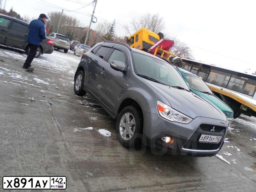 Фото автомобиля MITSUBISHI ASX, 2012 — госномер Е121КО154. Цвет: СЕРЫЙ