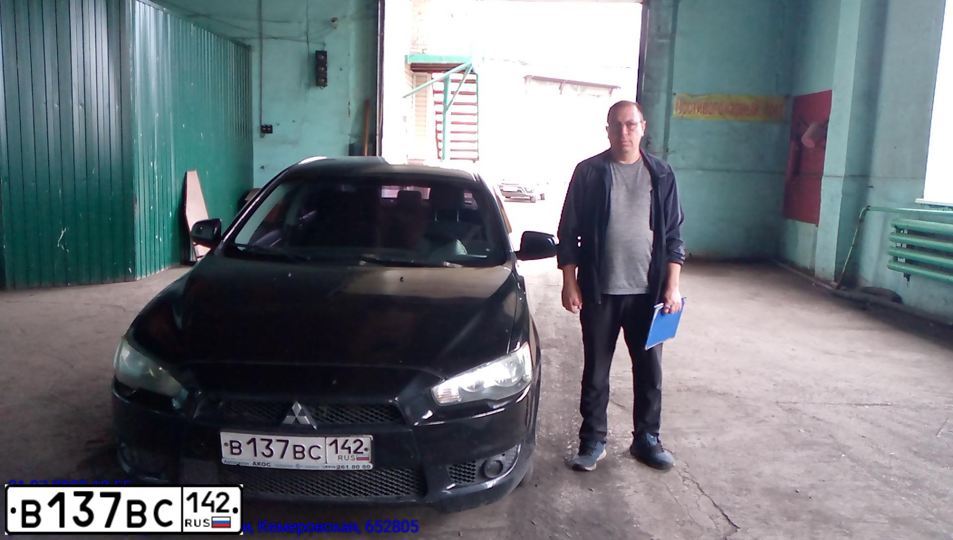 Фото автомобиля MITSUBISHI LANCER, 2007 — госномер В137ВС142. Цвет: ЧЕРНЫЙ