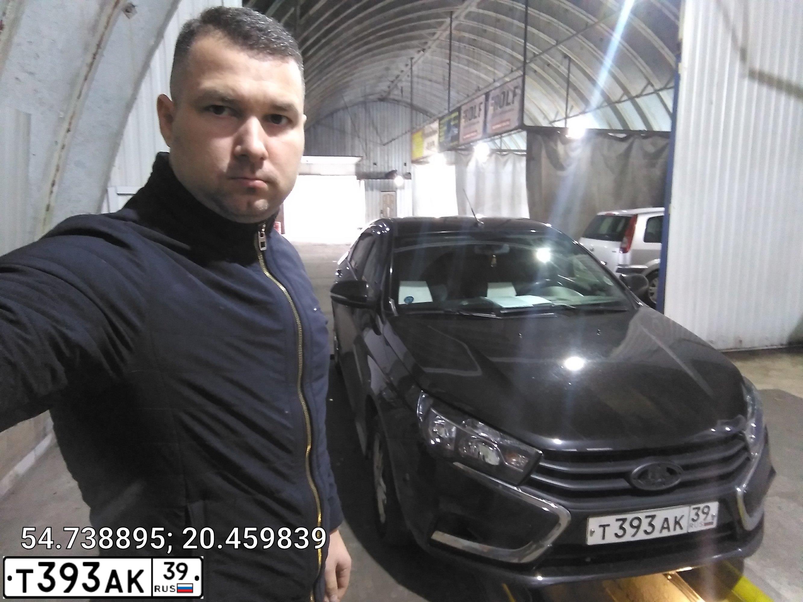 Фото автомобиля LADA VESTA, 2016 — госномер Т393АК39. Цвет: ЧЕРНЫЙ