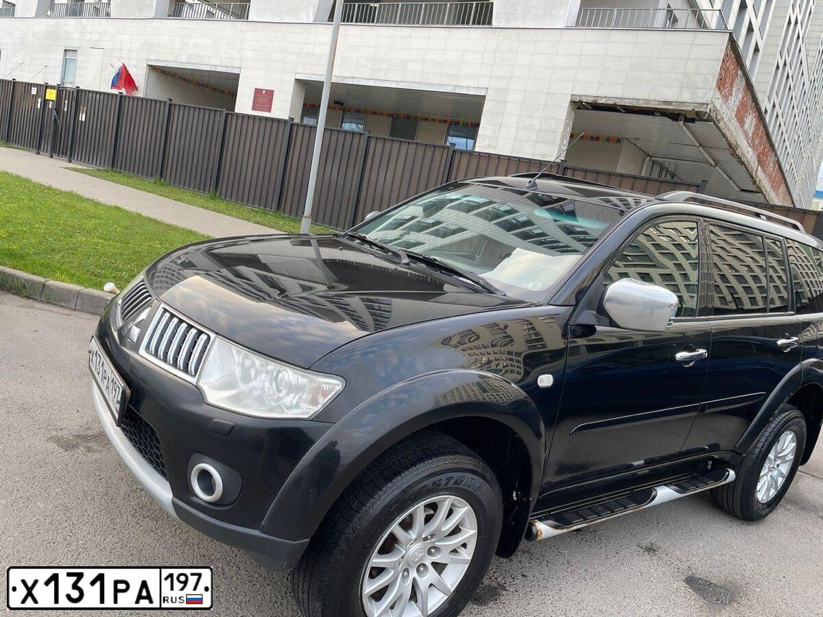 Фото автомобиля MITSUBISHI PAJERO SPORT, 2011 — госномер О112КТ71. Цвет: ЧЕРНЫЙ