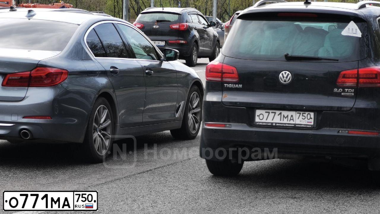Фото автомобиля VOLKSWAGEN TIGUAN, 2014 — госномер У001КУ69. Цвет: ЧЕРНЫЙ