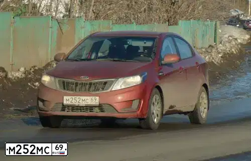 Фото автомобиля KIA RIO, 2012 — госномер М252МС69. Цвет: КРАСНЫЙ