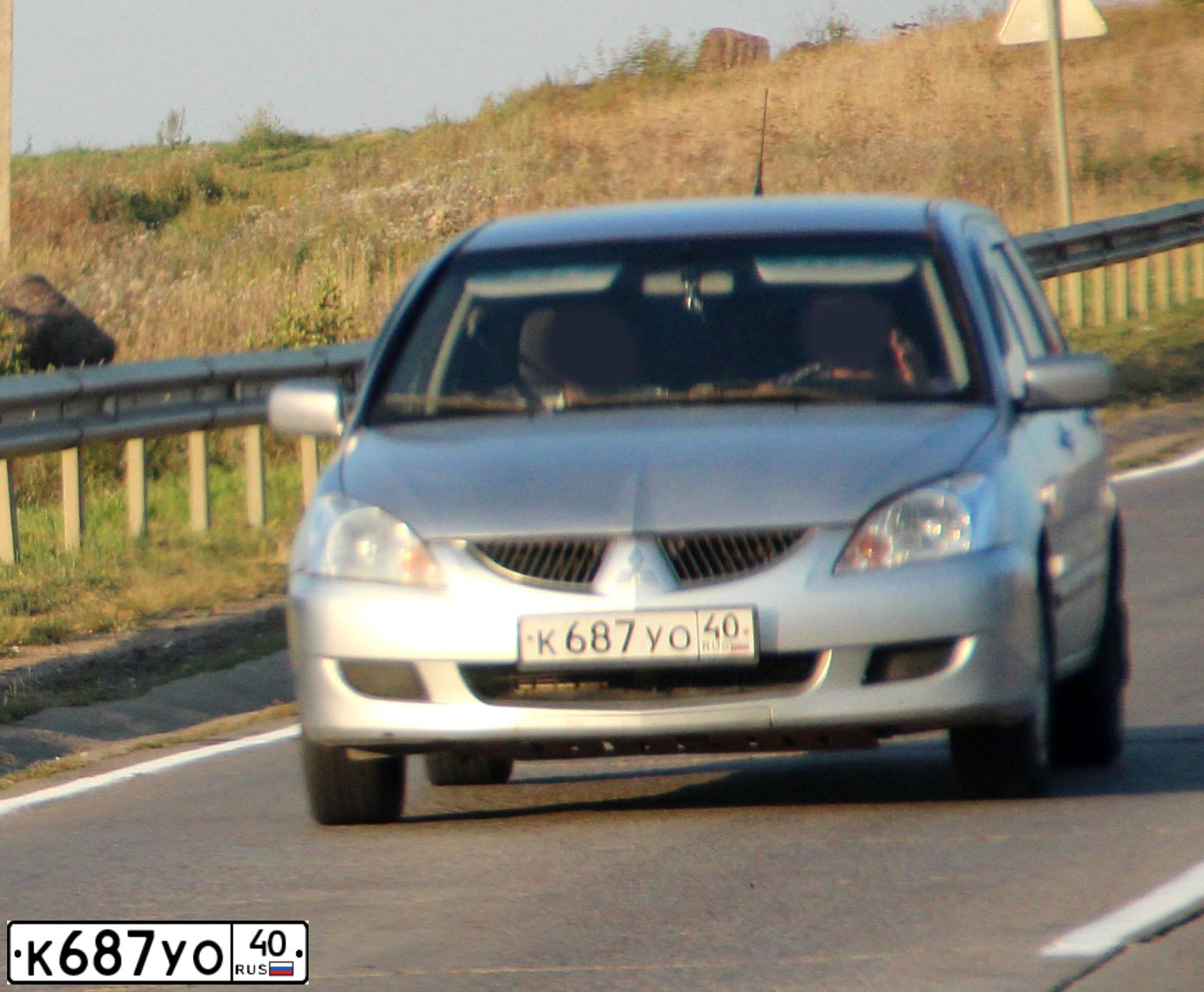 Фото автомобиля MITSUBISHI LANCER, 2004 — госномер О386ЕК40. Цвет: СЕРЕБРИСТЫЙ