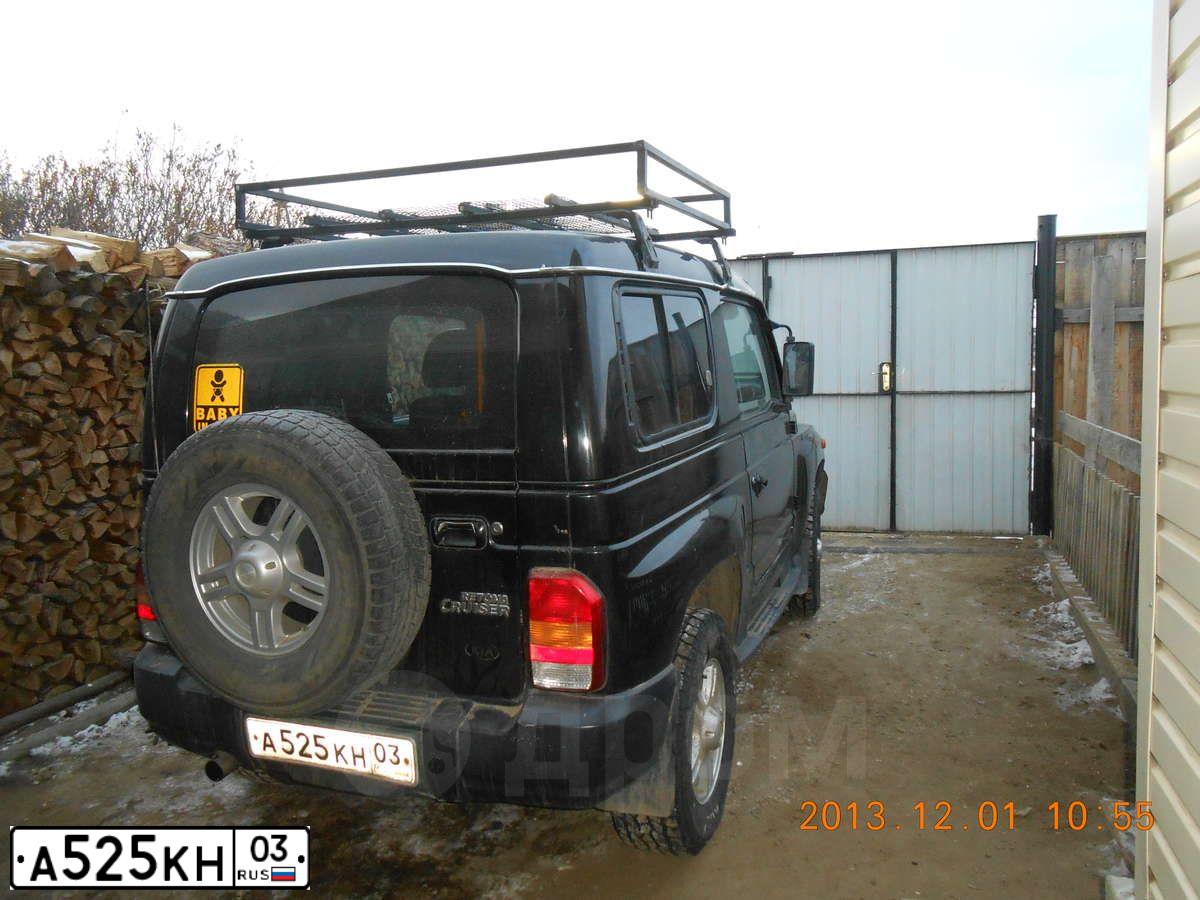Фото автомобиля KIA RETONA, 2001 — госномер Р400КО154. Цвет: ЧЕРНЫЙ