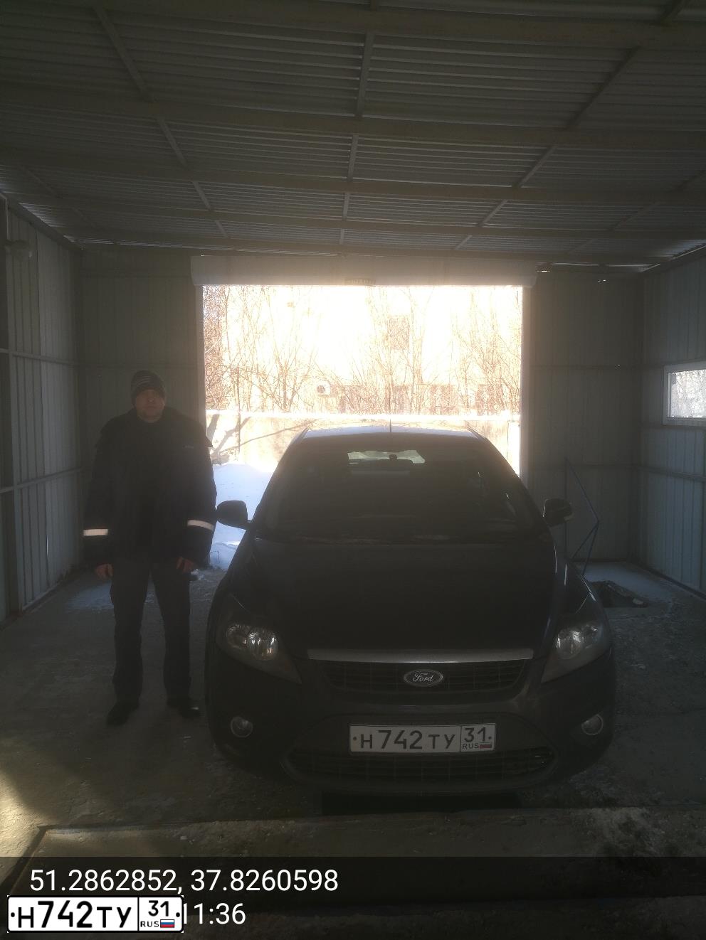 Фото автомобиля FORD FOCUS, 2009 — госномер Н742ТУ31. Цвет: темно-серый