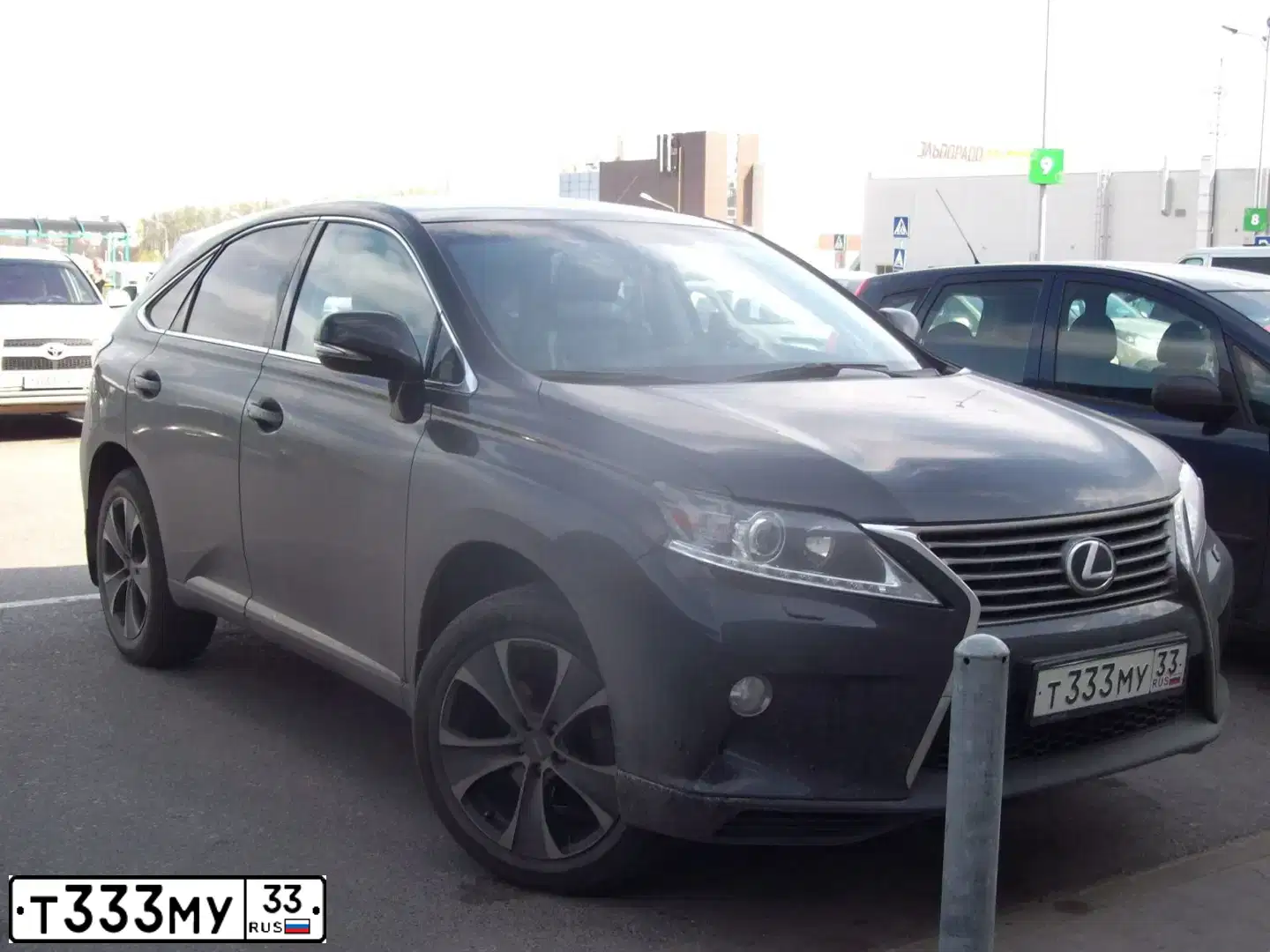 Фото автомобиля LEXUS RX, 2010 — госномер Т333МУ33. Цвет: Красный
