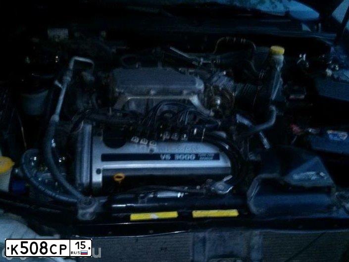 Фото автомобиля NISSAN MAXIMA, 1997 — госномер Е845СА124. Цвет: ТЕМНО-СЕРЫЙ МЕТАЛЛ