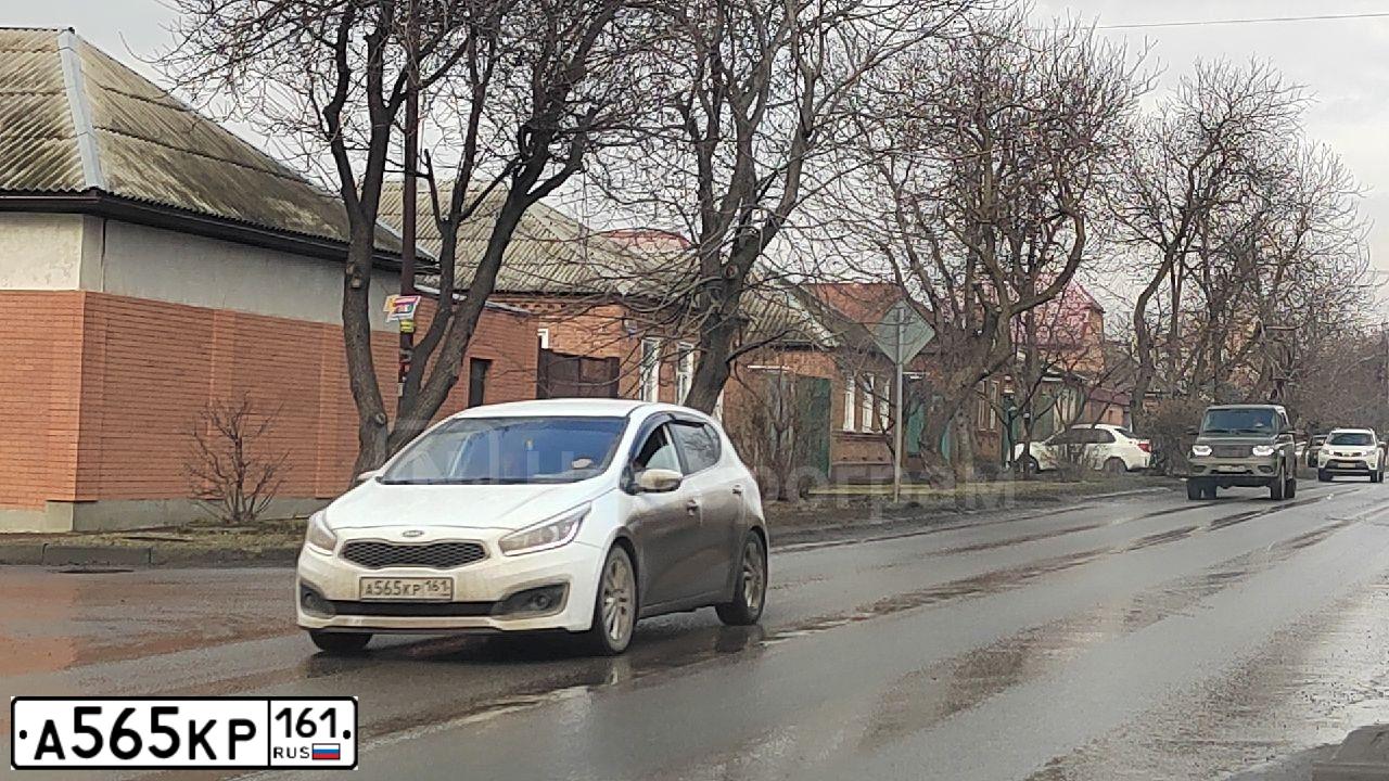 Фото автомобиля KIA CEE'D, 2014 — госномер А565КР161. Цвет: Белый