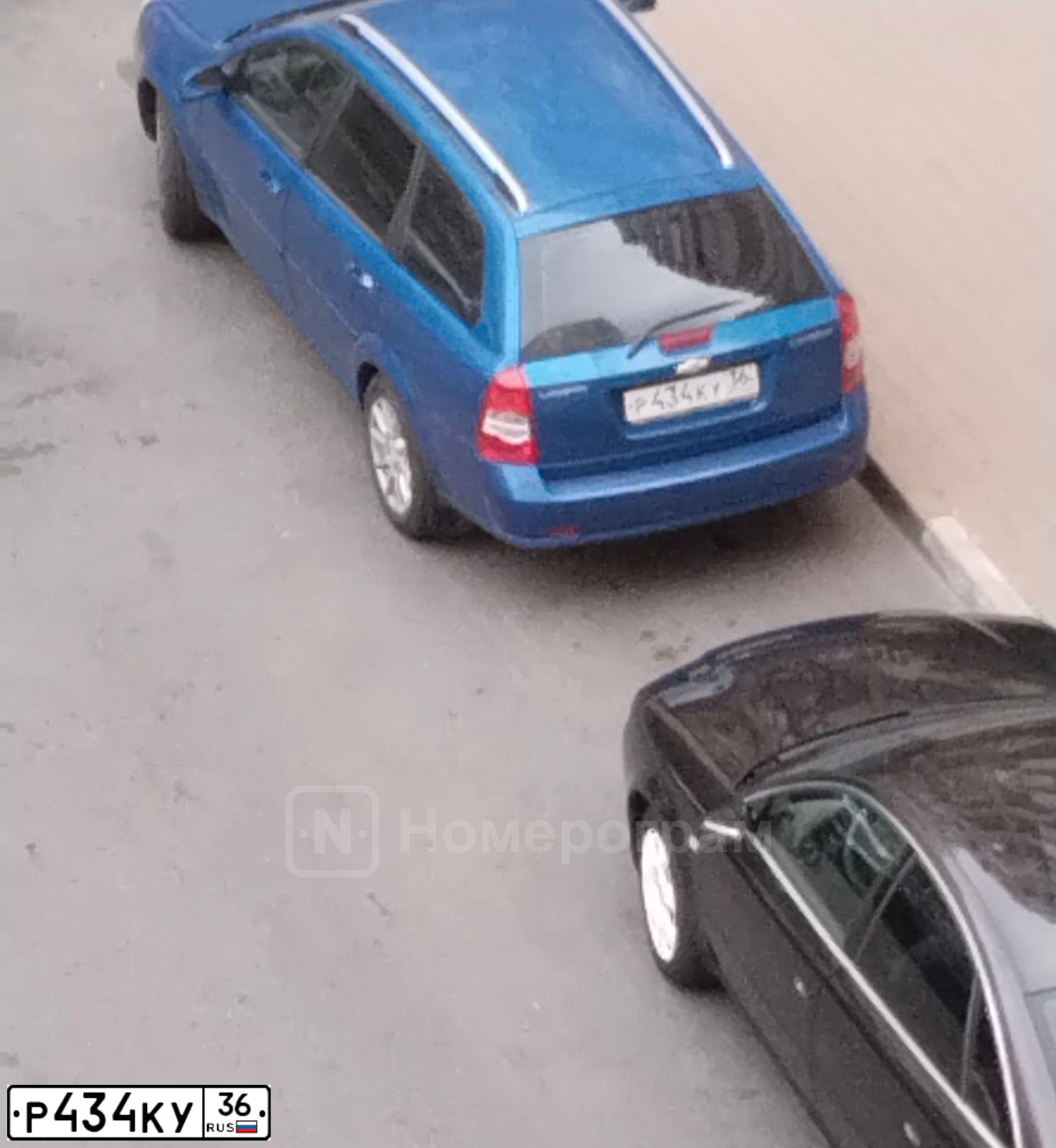 Фото автомобиля CHEVROLET LACETTI, 2009 — госномер Р434КУ36. Цвет: СИНИЙ
