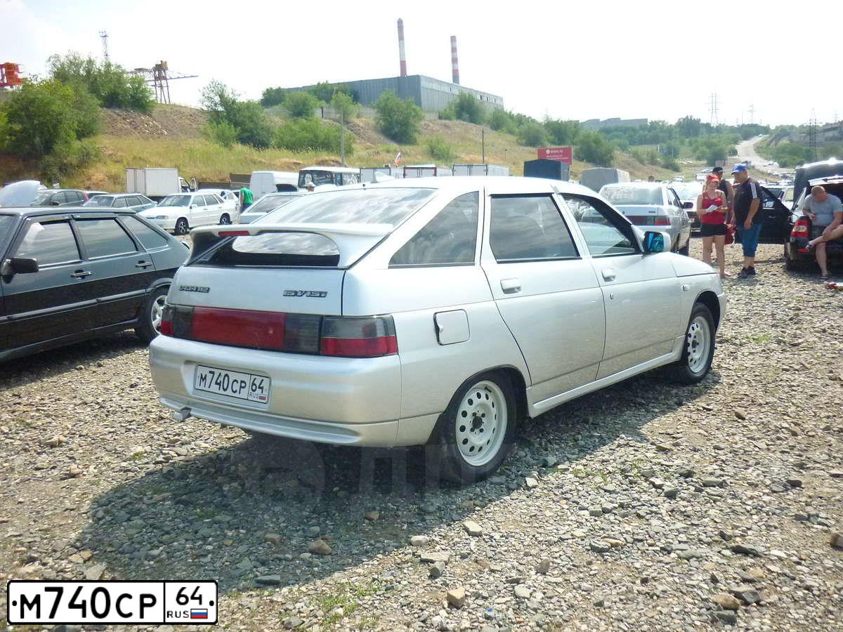 Фото автомобиля LADA 2112, 2004 — госномер В235ЕМ134. Цвет: Серебристый