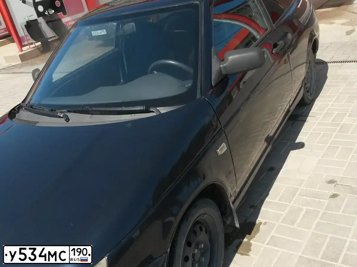 Фото автомобиля LADA 2112 LADA, 2009 — госномер Р245КО05. Цвет: ГРАФИТОВЫЙ МЕТАЛИК