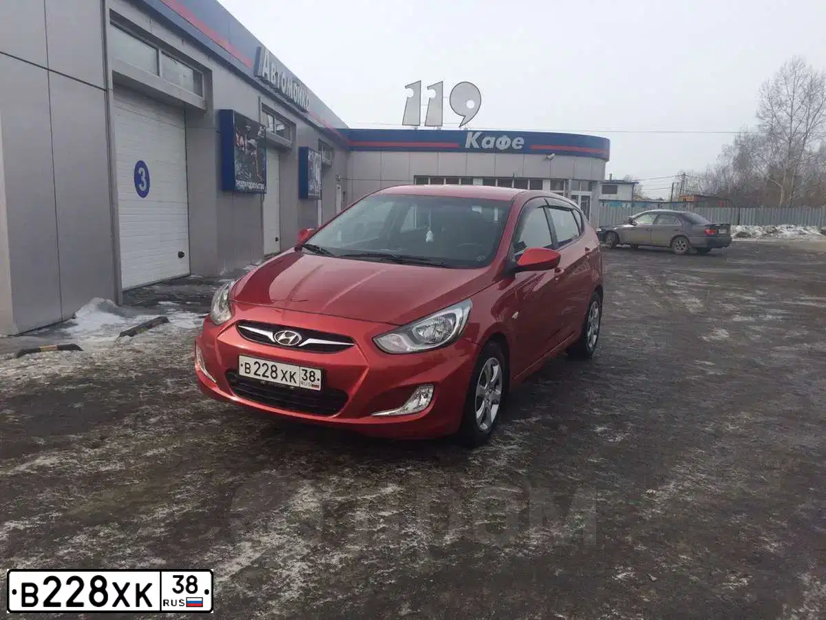 Фото автомобиля HYUNDAI SOLARIS, 2011 — госномер В228ХК38. Цвет: КРАСНЫЙ ГРАНАТ
