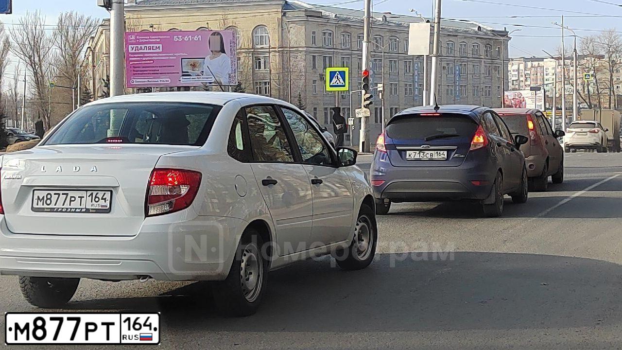 Фото автомобиля VAZ LADA GRANTA 219040, 2024 — госномер М877РТ164. Цвет: Белый