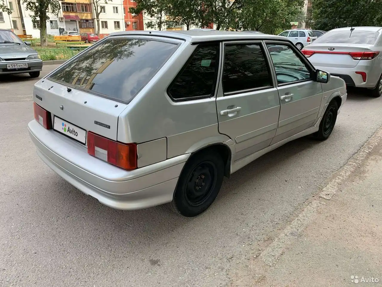 Фото автомобиля LADA 2114 SAMARA, 2010 — госномер К591ХН48. Цвет: СЕРО-ЗЕЛЕНЫЙ