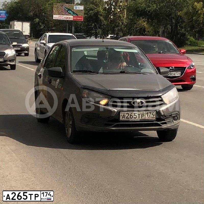 Фото автомобиля LADA 2190 GRANTA, 2015 — госномер А265ТР174. Цвет: Золотисто-коричневый