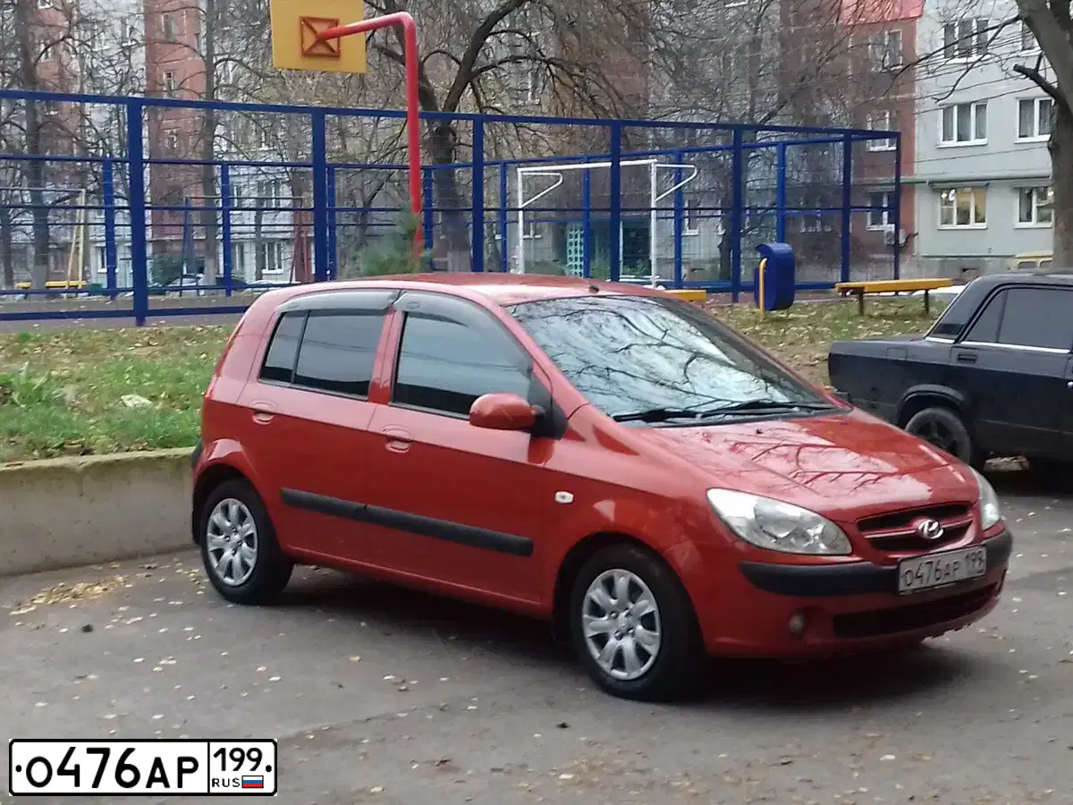 Фото автомобиля HYUNDAI GETZ, 2007 — госномер О476АР199. Цвет: Красный