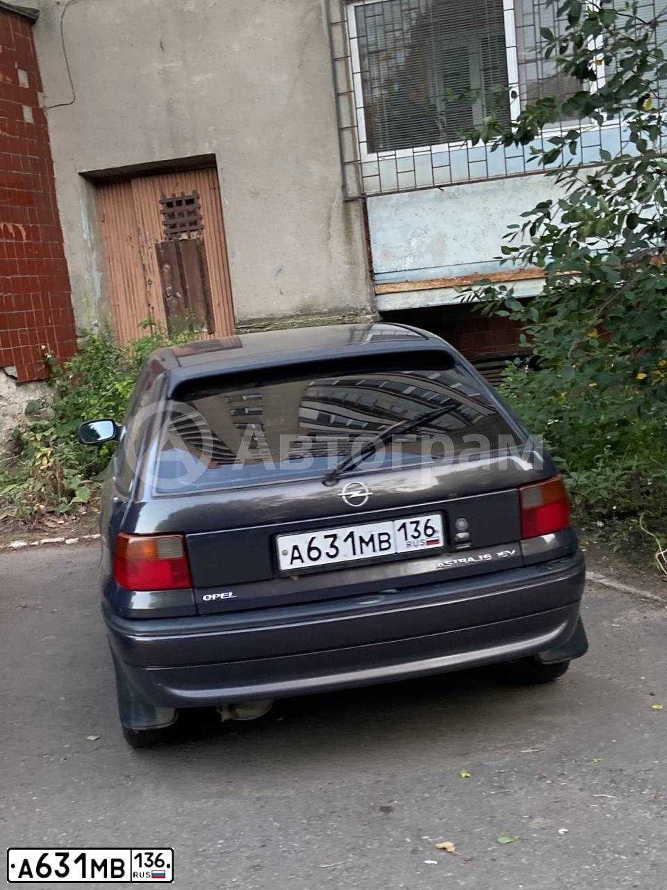 Фото автомобиля OPEL ASTRA, 1996 — госномер К401ЕН62. Цвет: Коричневый