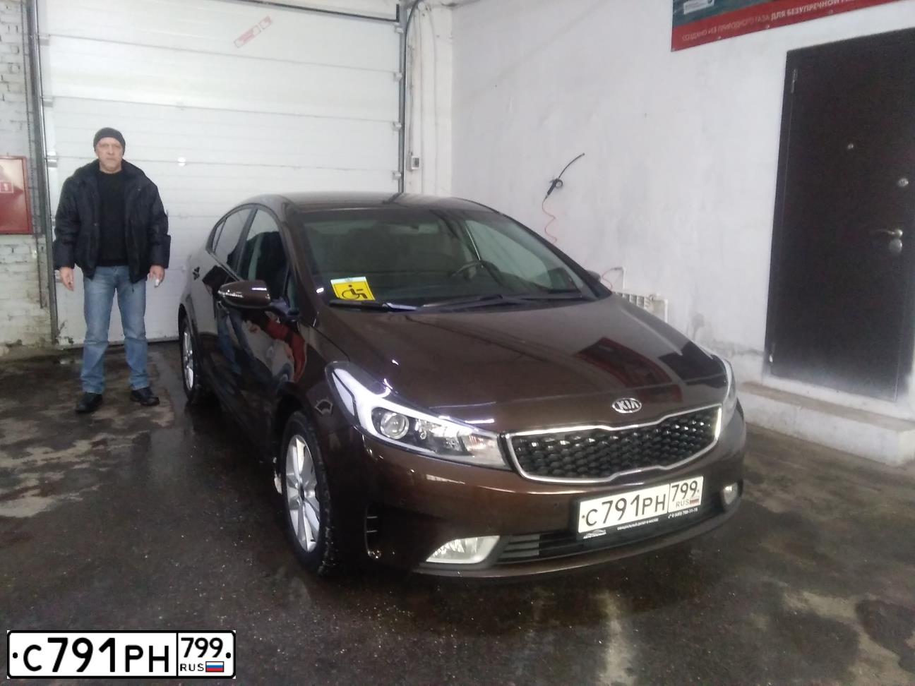 Фото автомобиля КИА YD (CERATO FORTE), 2019 — госномер С987УО790. Цвет: Коричневый