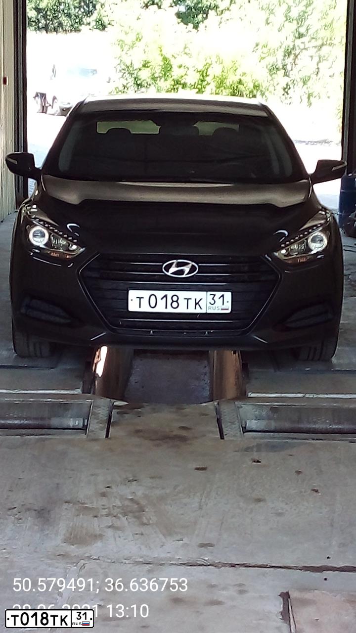 Фото автомобиля HYUNDAI I40, 2016 — госномер Т018ТК31. Цвет: Серый