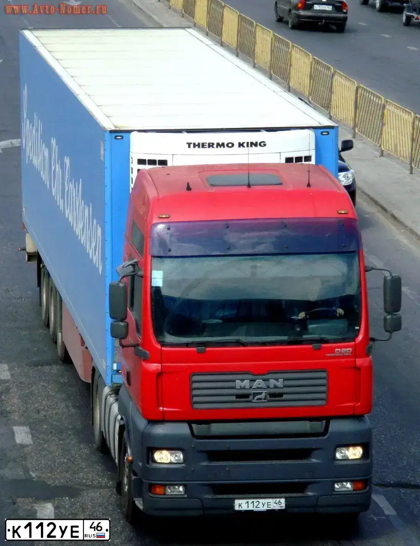 Фото автомобиля MAN TGA 18.XXX /4X2/, 2004 — госномер К112УЕ46. Цвет: Красный