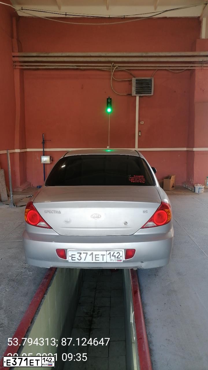 Фото автомобиля KIA SPECTRA, 2007 — госномер Е371ЕТ142. Цвет: АЛМАЗНОЕ СЕРЕБРО