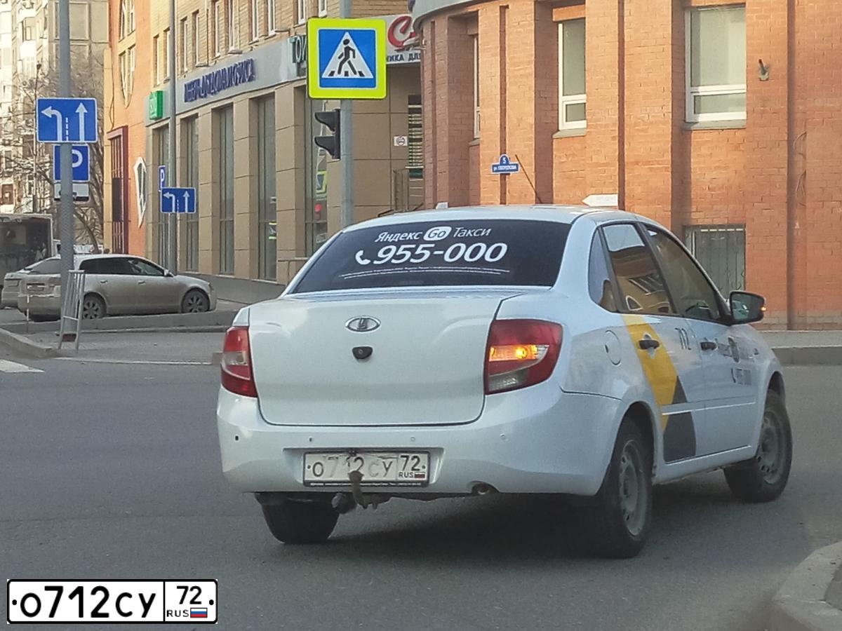 Фото автомобиля LADA 2190 GRANTA, 2013 — госномер О712СУ72. Цвет: Белый