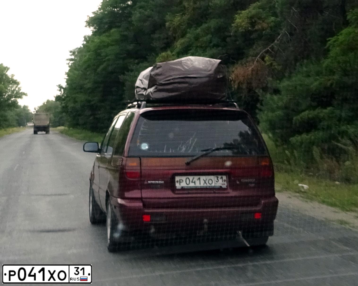 Фото автомобиля MITSUBISHI SPACE WAGON, 1995 — госномер О230УА46. Цвет: Красный