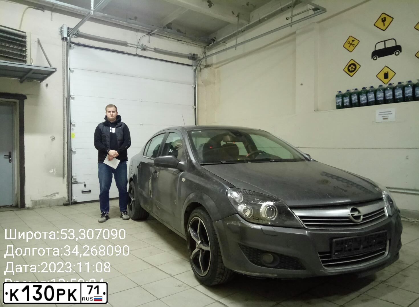 Фото автомобиля OPEL ASTRA, 2011 — госномер Р134ЕК32. Цвет: ТЕМНО-СЕРЫЙ